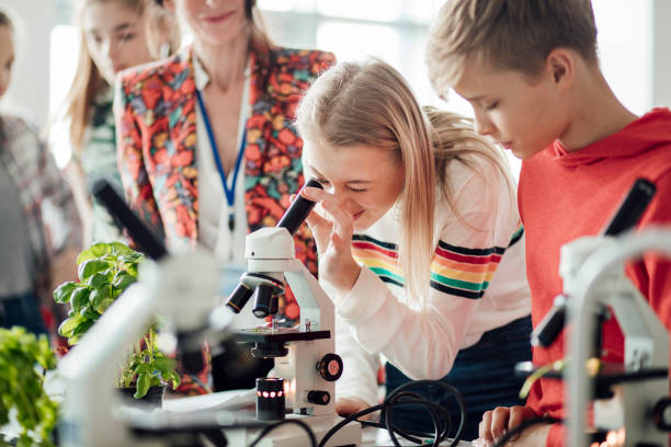 istock Female Student in Biology Class 911030310