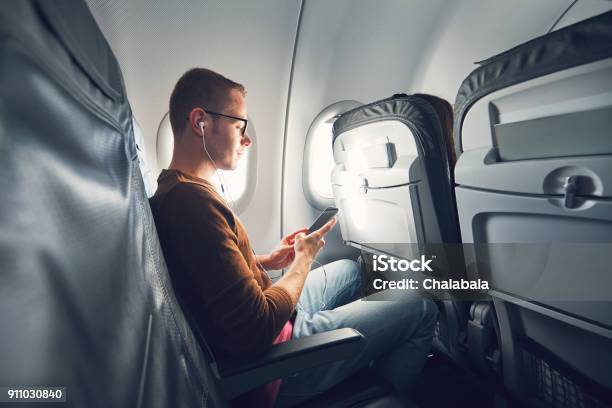 Connection In The Airplane Stock Photo - Download Image Now - Airplane, People, Telephone