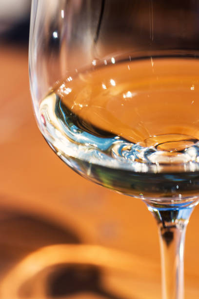 istock Glass of White Wine Close Up 911033838