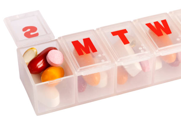 istock Close up shot of pill container with vitamins. Clipping path 911042580