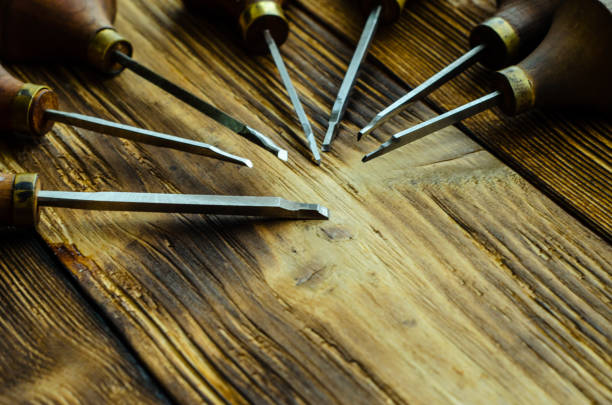 istock Different gravers for jewelry on wooden background 911046474
