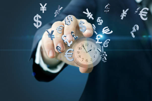 istock Clock and currency symbols shows the man . 911049672