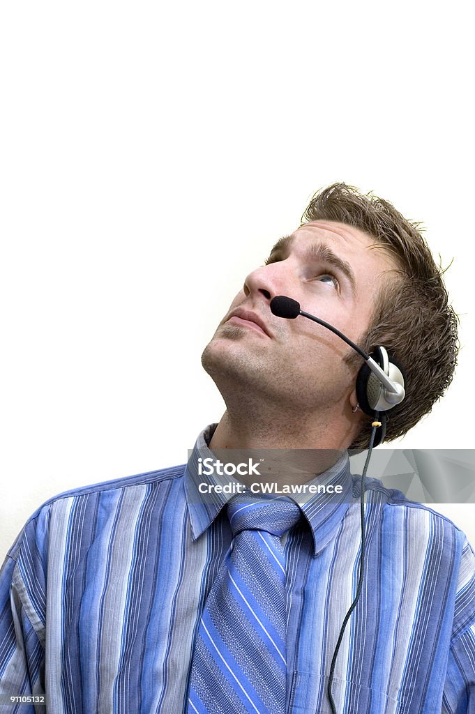 Homme d'affaires avec un casque à la recherche - Photo de Casque téléphonique libre de droits