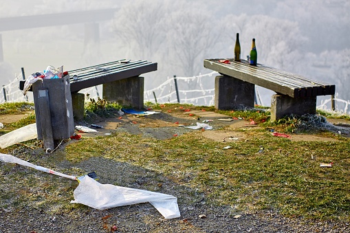 Twe benches above the valley with typical waste of silvester at new years day