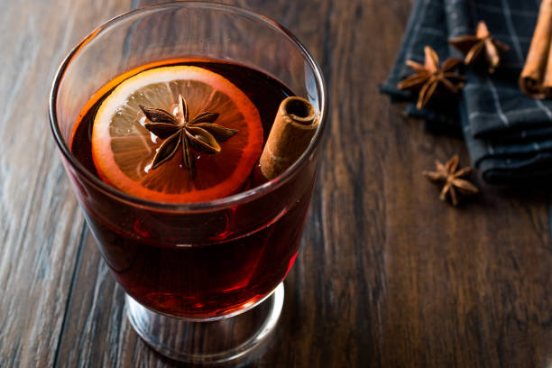 istock Hot Wine for Winter. Prepared with Anise, Spices, Cinnamon Sticks and Orange Slice. 911054568