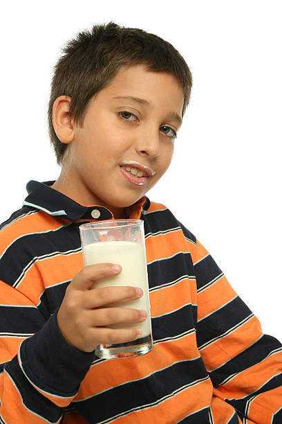 istock Boy drinking a glass of milk 91106008