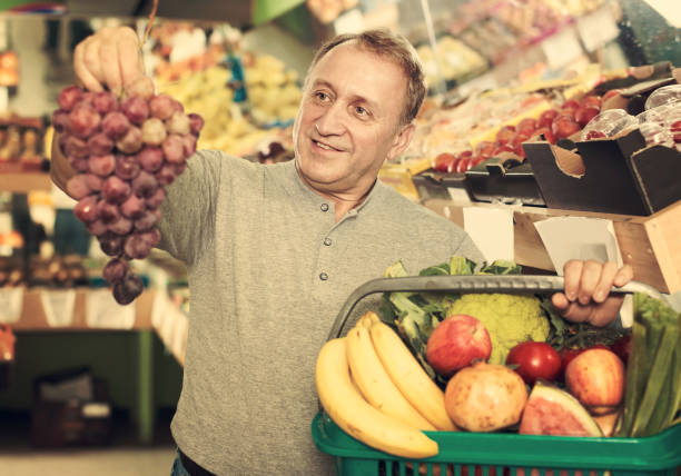 istock Smiling man is demonstraiting basket 911064374