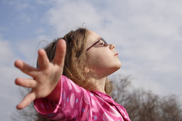 istock Young Girl Looking Toward the Sun 91106515