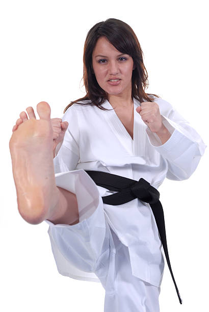 aplicación de la técnica - sole of foot martial arts karate female fotografías e imágenes de stock