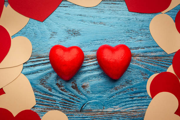 istock Valentines day background decorated with red hearts/copy space 911079454