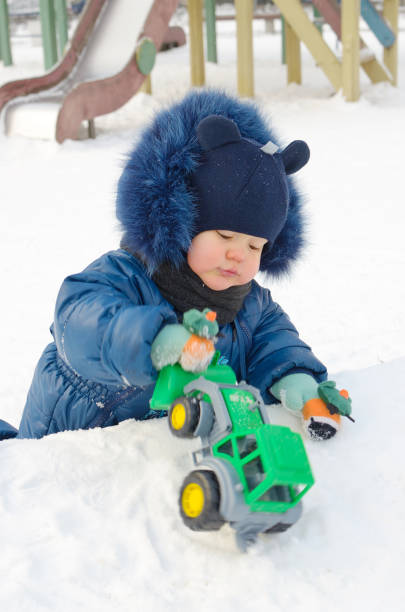 istock Little Timosha is playing on the Playground. 911096742