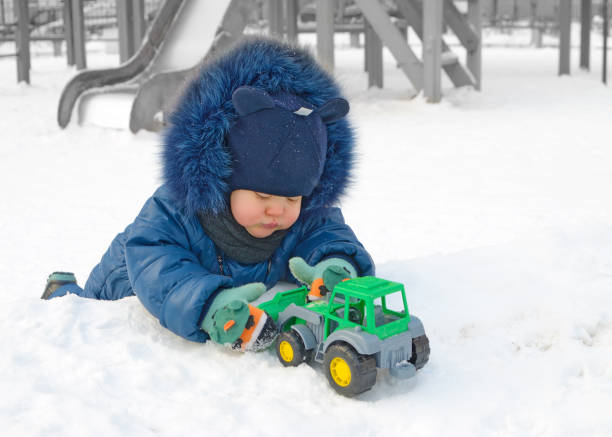 istock Little Timosha is playing on the Playground. 911096752