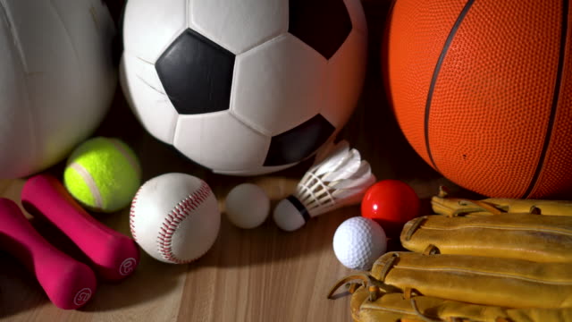 Sports Equipment on wooden background