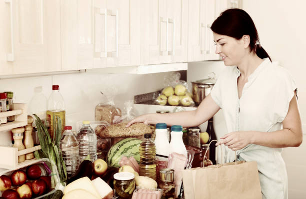 istock Female is posing in time cooking 911115594