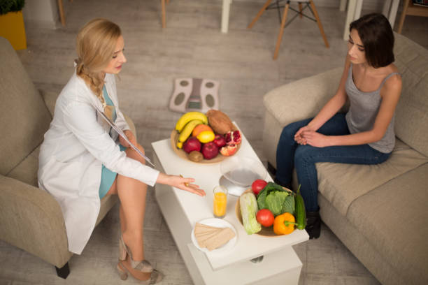 istock A beautiful nutritionist consult at the office 911119598