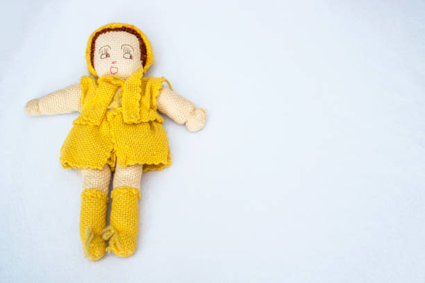 istock Handmade Vintage Knit Doll on White Background 911131800