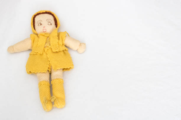 istock Vintage Handmade Knit Doll on White Background 911131820