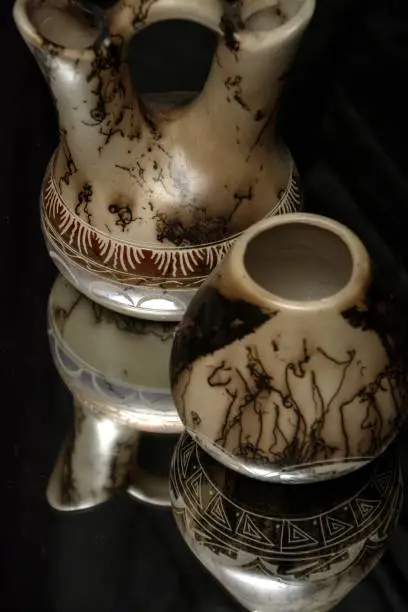 Two Pueblo Indian pots.  Wedding vase and smaller vase.