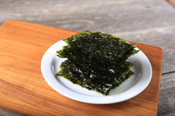 istock Dried seaweed on white plate 911153526