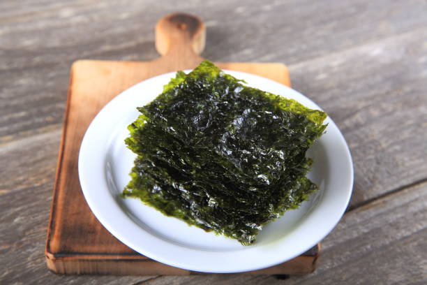 istock Dried seaweed on white plate 911153736