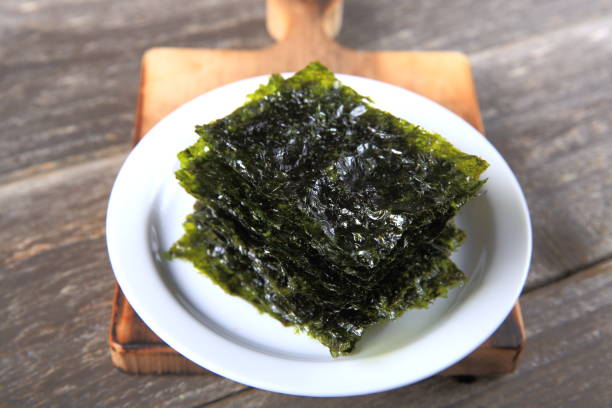 istock Dried seaweed on white plate 911153776