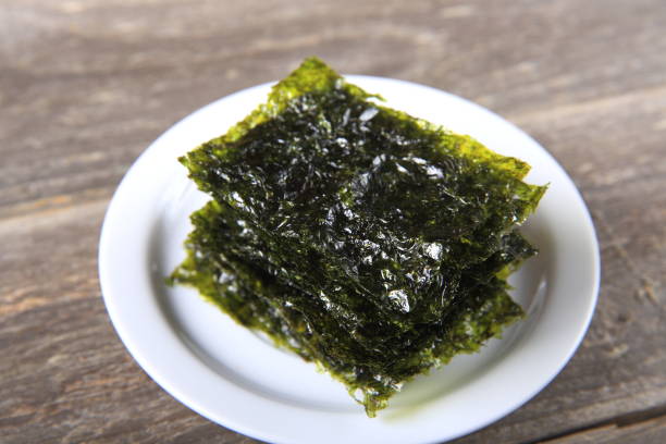 istock Dried seaweed on white plate 911153906