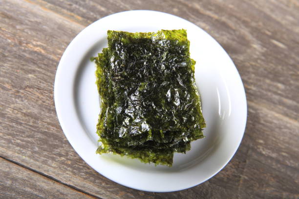 istock Dried seaweed on white plate 911154076
