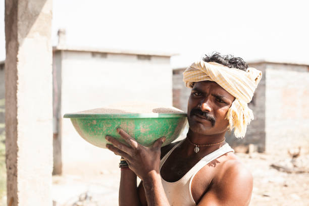 istock Indian man worker at local village job site. 911155654