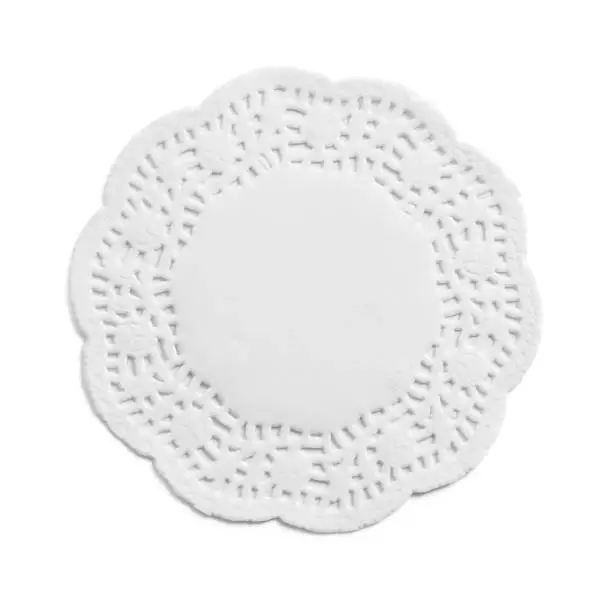 Ornate Paper Doily Isolated on a White Background.