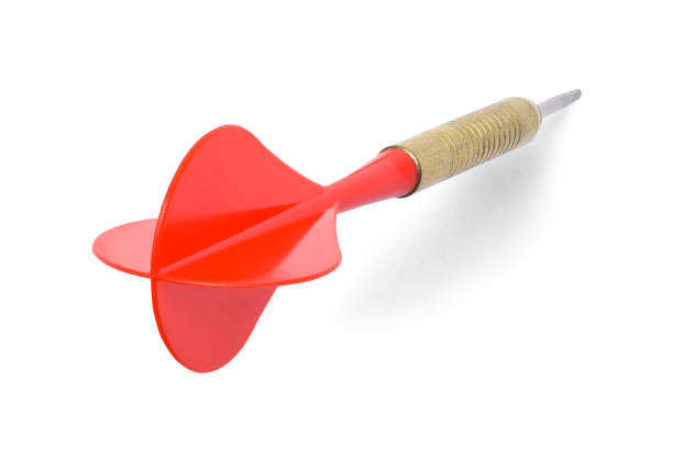 Red Dart Stuck Red Dart Stuck on a White Background. darts stock pictures, royalty-free photos & images