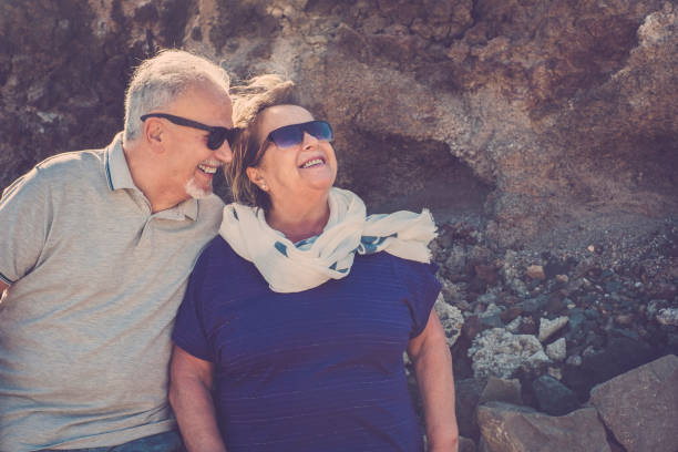 istock senior couple with eyeglasses looking at the sun 911174714