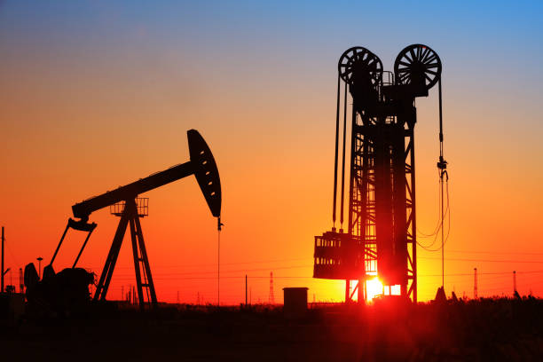istock The silhouette of tower type pumping unit 911180510