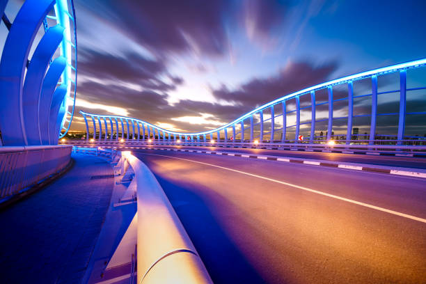 Meydan Bridge Dubai at Night Meydan Bridge Dubai at Night derby city stock pictures, royalty-free photos & images