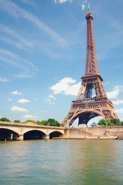 istock Eiffel Tower by Seine river in Paris, France 911207860
