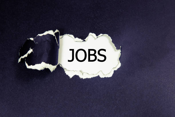 istock The text jobs appearing behind torn paper 911218702