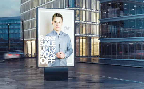 Photo of super fashion sale billboard on the street