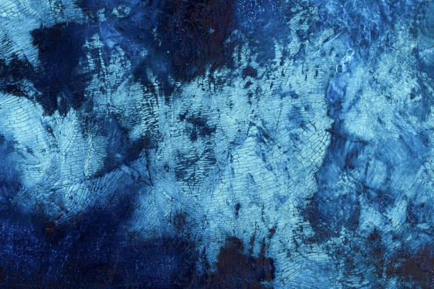 istock Colorful blue abstract painting surface macro close up 911229234