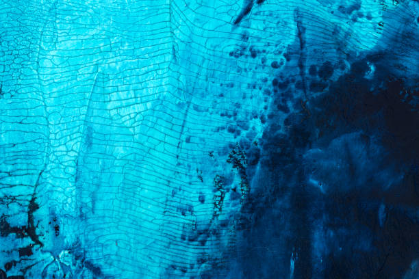 istock Colorful blue abstract painting surface macro close up 911231866