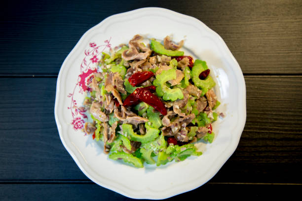 istock fried bitter gourd and chicken gizzard 911246296