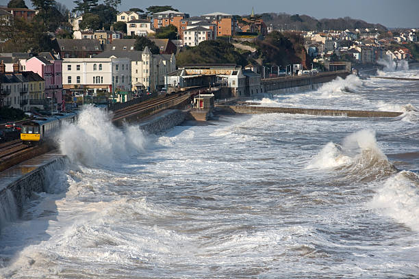 istock Train leaving Dawlish station in a storm 91124684