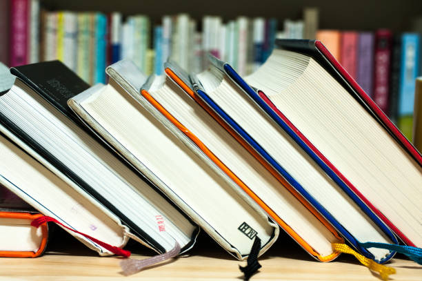 istock A books piled on a desk. 911263722