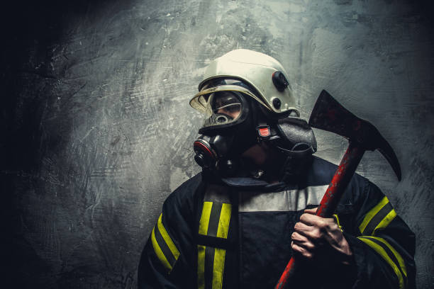 istock Rescue man in firefighter uniform. 911270888