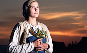 Closeup portrait of slavic woman from the past. Historical reconstruction of the image