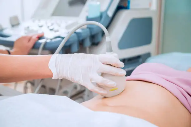 Photo of Ultrasound scanner in the hands