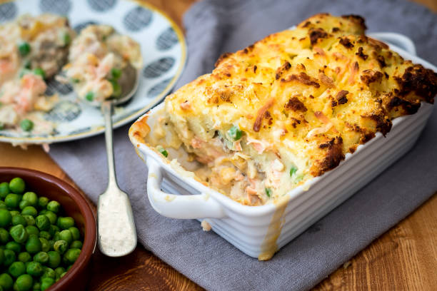 Fish Pie A lovely fish pie with peas stock fish stock pictures, royalty-free photos & images