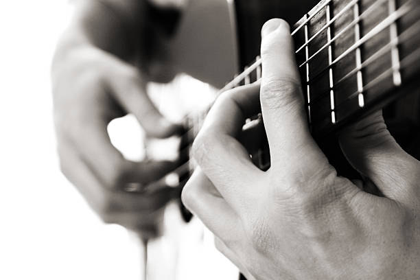 istock barre chord on acoustic guitar 91130045