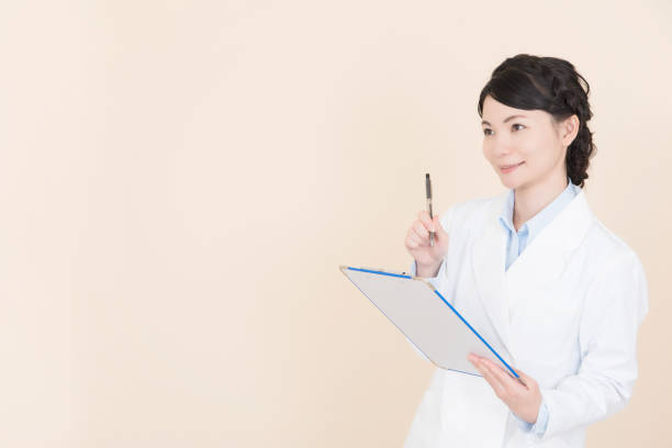 istock The young woman who writes a memo 911306412