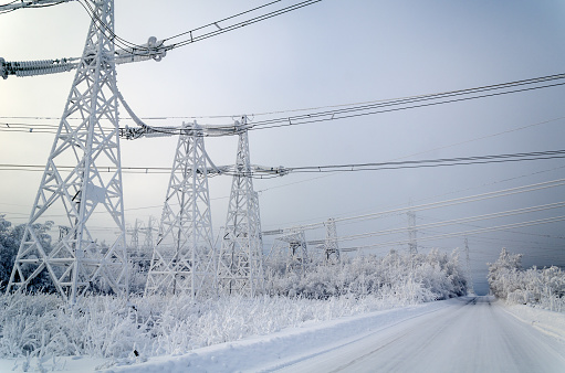 High voltage power lines in the winter.