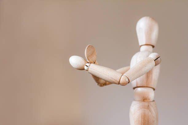 istock Wooden mannequin isolated on white background 911309748