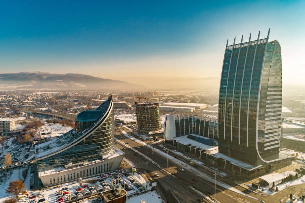 Aerial view of financial business district with heavy air pollution smog around Aerial view of financial business district with heavy air pollution smog around. The scene takes place near financial and industrial district near or short after sunset outdoors in the city of Sofia, Bulgaria (Eastern Europe). The footage is taken with DJI Phantom 4 Pro video drone / quadcopter. bulgaria stock pictures, royalty-free photos & images